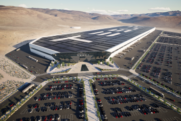 Tesla Gigafactory exterior — Tesla Gigafactory as symbol of scale required to meet $7.5T value creation target.