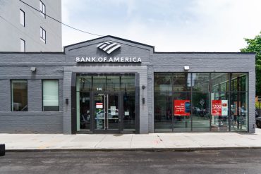 Investment analysts monitor Bank of America momentum stock picks amid AI infrastructure boom and shifting market trends in global equity sectors.