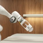Elderly patient undergoing diagnostics with modern medical device in clinical setting, representing longevity-focused healthcare innovation