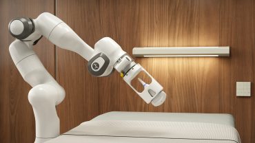 Elderly patient undergoing diagnostics with modern medical device in clinical setting, representing longevity-focused healthcare innovation