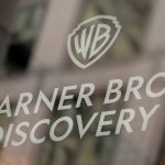 Signage at the Warner Bros. Discovery headquarters in New York, US, on Thursday, June 12, 2025. Warner Bros. Discovery Inc. is splitting itself in half, unshackling its fast-growing streaming business from the struggling legacy media channels and setting up two independent companies that could pursue deals on their own. Photographer: Victor J. Blue/Bloomberg via Getty Images
