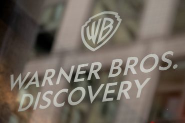 Signage at the Warner Bros. Discovery headquarters in New York, US, on Thursday, June 12, 2025. Warner Bros. Discovery Inc. is splitting itself in half, unshackling its fast-growing streaming business from the struggling legacy media channels and setting up two independent companies that could pursue deals on their own. Photographer: Victor J. Blue/Bloomberg via Getty Images