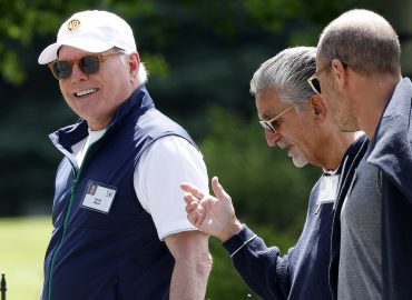 David Zaslav, CEO of Warner Bros. Discovery, Ted Leonsis, CEO of Monumental Sports & Entertainment, and Joey Levin, CEO of Angie's List, walk from a morning session at the Allen & Company Sun Valley Conference / Photo by Kevin Dietsch / Getty Images