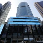 Morgan Stanley headquarters building with digital cloud and supply chain icons overlaid