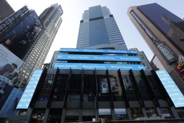 Morgan Stanley headquarters building with digital cloud and supply chain icons overlaid