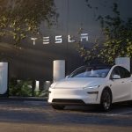 Tesla HQ building with brand name in metallic letters, symbolizing corporate resilience and Q2 financial results