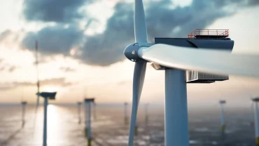 Wind turbines in U.S. plains, part of BP’s wind energy portfolio sold to LS Power in fossil fuel strategy shift.