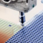Texas Instruments campus and logo reflecting semiconductor sector volatility