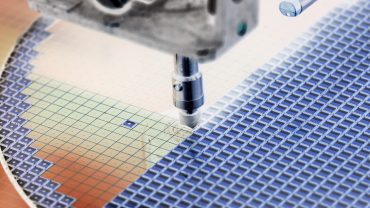 Texas Instruments campus and logo reflecting semiconductor sector volatility