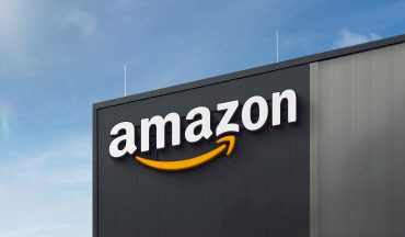 Amazon Echo and Bee wearable device side by side with AI data visualization overlay
