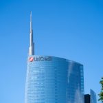 UniCredit logo at Milan HQ as bank lifts profit forecast to €10.5B and exits €14.6B Banco BPM deal