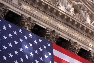 Traders celebrate S&P 500 record high on Wall Street trading floor