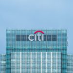 Citigroup London headquarters with financial charts overlay, symbolizing record quarterly profits and stock buyback announcement.