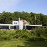 ASML building with EUV lithography system representing Q2 earnings performance and semiconductor sector trends.