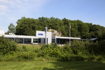 ASML building with EUV lithography system representing Q2 earnings performance and semiconductor sector trends.