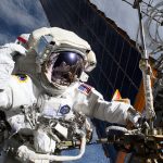 NASA astronaut and Expedition 72 flight engineer Anne McClain is pictured near one of the International Space Station’s main solar arrays during a spacewalk. NASA/Nichole Ayers
