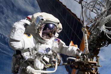 NASA astronaut and Expedition 72 flight engineer Anne McClain is pictured near one of the International Space Station’s main solar arrays during a spacewalk. NASA/Nichole Ayers