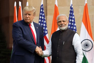 U.S President Donald Trump, left, shakes hand with Narendra Modi, India's prime minister, as they pose for photographers at Hyderabad House in New Delhi, India, on Tuesday, Feb. 25, 2020.