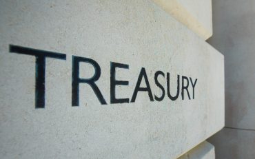 A sign on the HM Treasury building, Westminster, London, UK, on Monday, June, 20, 2022. The chairman of Boris Johnson's ruling Conservatives resigned after the party lost two key parliamentary seats in one night, raising fresh concerns about Johnsons leadership and his faltering popularity with voters.