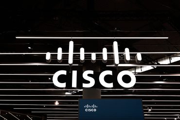The Cisco logo is on display at their pavilion during the Mobile World Congress in Barcelona, Spain, on February 28, 2024.