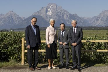 Federal Reserve Chairman Jerome Powell (R) is seen with Bank of Japan Governor Kazuo Ueda (2nd R) European Central Bank Governor Christine Lagarde (2nd L) and Governor of the Bank of England Andrew Bailey (L) in Grand Teton National Park on August 22, 2025 near Jackson Hole, Wyoming. Powell spoke Friday at the annual Jackson Economic Symposium. (Photo by Natalie Behring/Getty Images)