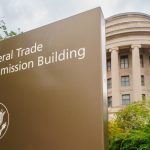 WASHINGTON, DC - AUGUST 20: A sign masks the location of the Federal Trade Commission (FTC) headquarters building on August 20, 2025, in Washington, DC. (Photo by J. David Ake/Getty Images)