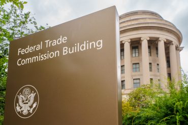 WASHINGTON, DC - AUGUST 20: A sign masks the location of the Federal Trade Commission (FTC) headquarters building on August 20, 2025, in Washington, DC. (Photo by J. David Ake/Getty Images)