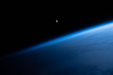 The waning crescent Moon is pictured from the International Space Station as it flew into an orbital sunrise 260 miles above the Atlantic Ocean off the northwest coast of the United States