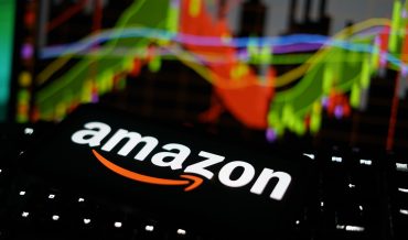Los Angeles, California - July 8 2025: Amazon Logo On Smartphone And Desktop With Ecommerce And Tech Stock Performance