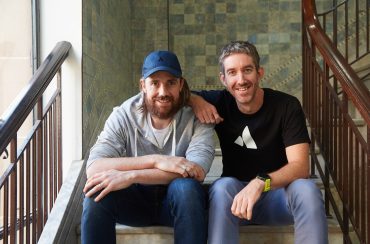Mike Cannon-Brookes (L) and fellow founder of Atlassian, Scott Farquhar pictured together in their Sydney HQ