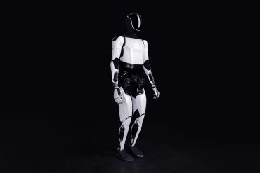 Tesla Optimus humanoid robot — Tesla’s Optimus AI robot highlights robotics expansion tied to Musk compensation goals.