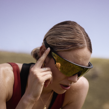 User wearing AI-powered Meta smart glasses with see-through display