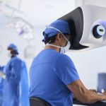 Robotic-assisted surgical system in operation, highlighting AI integration in clinical practice.