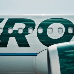 Frontier Airlines planes taxi at Denver International Airport in Denver, Colorado