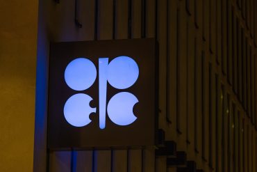 A logo outside the headquarters of the Organization of the Petroleum Exporting Countries (OPEC) in Vienna, Austria, on Wednesday, July 5, 2023. Oil rose as traders weighed Saudi Arabian and Russian production cuts after a slew of low-volume trading sessions. Photographer: Andrey Rudakov/Bloomberg via Getty Images
