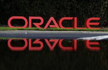 A sign is posted in front of Oracle headquarters on March 11, 2024 in Redwood Shores, California. Oracle will report third quarter earnings today after the closing bell. (Photo by Justin Sullivan/Getty Images)