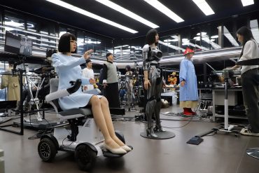 A technician works on the bionic humanoid robots at a workshop of Ex-Robots factory on June 23, 2025 in Dalian, Liaoning Province of China. Ex-Robots is one of the largest and most advanced factories in China for creating hyper-realistic humanoid robots. (Photo by VCG/VCG via Getty Images)