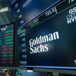 Goldman Sachs Group signage on the floor of the New York Stock Exchange (NYSE) in New York, US, on Thursday, July 24, 2025. Accelerant Holdings' shares surged over 30% in its public debut after the company and some of its backers raised $724 million in an upsized US initial public offering, the latest insurance-related listing to meet with strong demand. Photographer: Michael Nagle/Bloomberg via Getty Images