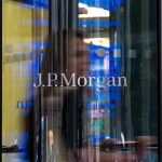 JPMorgan headquarters building in New York City with corporate logo on facade.
