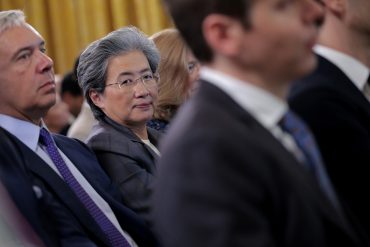 Advanced Micro Devices CEO Lisa Su (C) attends a meeting of the White House Task Force on Artificial Intelligence Education White House exterior — The White House in Washington, D.C., venue of the AI Summit with U.S. tech leaders.