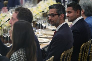 Google CEO Sundar Pichai listens during a dinner at the State Dining Room of the White House