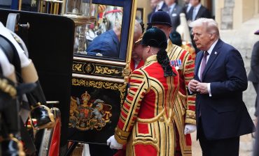 Britain's King Charles III and US President Donald Trump arrive in The Irish State Coach during a horse-drawn procession at Windsor Castle, in Windsor, on September 17, 2025 / Photo by Jonathan Brady / POOL / AFP via Getty Images
