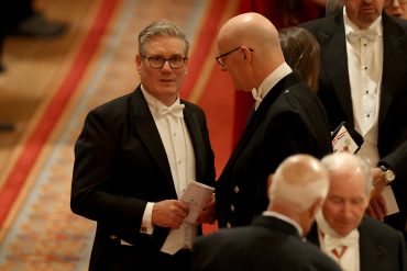 ritain's Prime Minister Keir Starmer (L) speaks to Scotland's First Minister John Swinney during a State Banquet at Windsor Castle, in Windsor, on September 17, 2025, during the US President's second State Visit. US President Donald Trump arrived in Britain for an unprecedented second State Visit, with the UK government rolling out a royal red carpet welcome to win over the mercurial leader. (Photo by Phil Noble / POOL / AFP) (Photo by PHIL NOBLE/POOL/AFP via Getty Images)