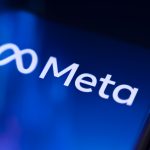Meta logo on the smartphone Visual representation of Meta platforms offering paid ad-free subscription alternative alongside free ad-supported access.
