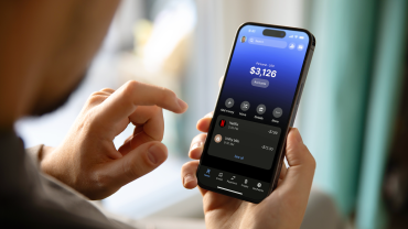 Smartphone with Revolut app — Revolut targets $38.5B remittance market in the UAE.