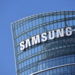 Samsung sign, logo, emblem on the facade of the Samsung Electronics skyscraper tower.
