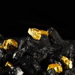 Stacked gold bars representing safe-haven demand amid global geopolitical uncertainty