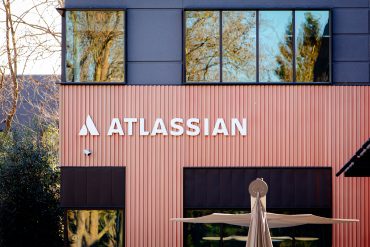 Atlassian logo sign at the company headquarters in Silicon Valley. Atlassian Corporation is an Australian proprietary software company