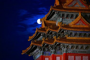 A full moon lights up the night sky on the Mid-Autumn Festival