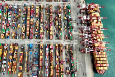 A ship is seen at the container terminal of the port in Qingdao, in China's eastern Shandong province on October 9, 2025